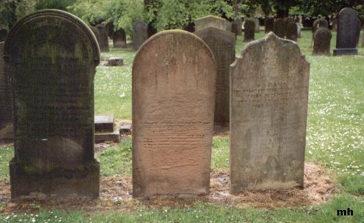 weathered gravestones in Western Cemetery